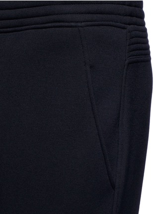 Detail View - Click To Enlarge - NEIL BARRETT - Eco leather knee cropped biker jogging pants