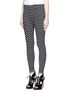 Front View - Click To Enlarge - ALAÏA - 'Fidji' bicolour perforated zigzag knit leggings