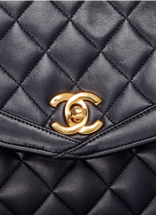  - VINTAGE CHANEL - Quilted lambskin leather rounded flap bag