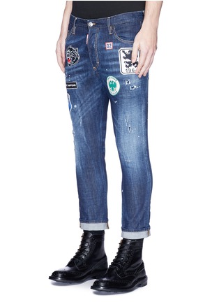 Front View - Click To Enlarge - 71465 - Glam Head' logo badge skinny jeans