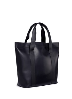 BALENCIAGA | Perforated logo leather tote bag | Men | Lane