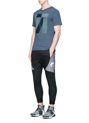Figure View - Click To Enlarge - NIKE - 'Nike International' logo print track pants