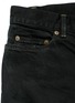  - SAINT LAURENT - Low rise distressed skinny jeans