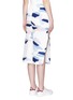 Back View - Click To Enlarge - C/MEO COLLECTIVE - 'Need to Know' paper strip print skirt