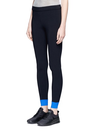 Front View - Click To Enlarge - NO KA’OI - Colourblock performance leggings with gummed zip pouch