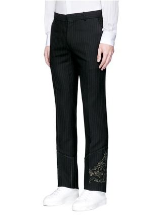 Front View - Click To Enlarge - ALEXANDER MCQUEEN - Floral crest appliqué pinstripe pants