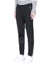 Front View - Click To Enlarge - ALEXANDER MCQUEEN - Silk satin patch zip cuff pants