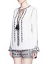 Front View - Click To Enlarge - TALITHA - Diamond embroidered bell sleeve tassel tunic
